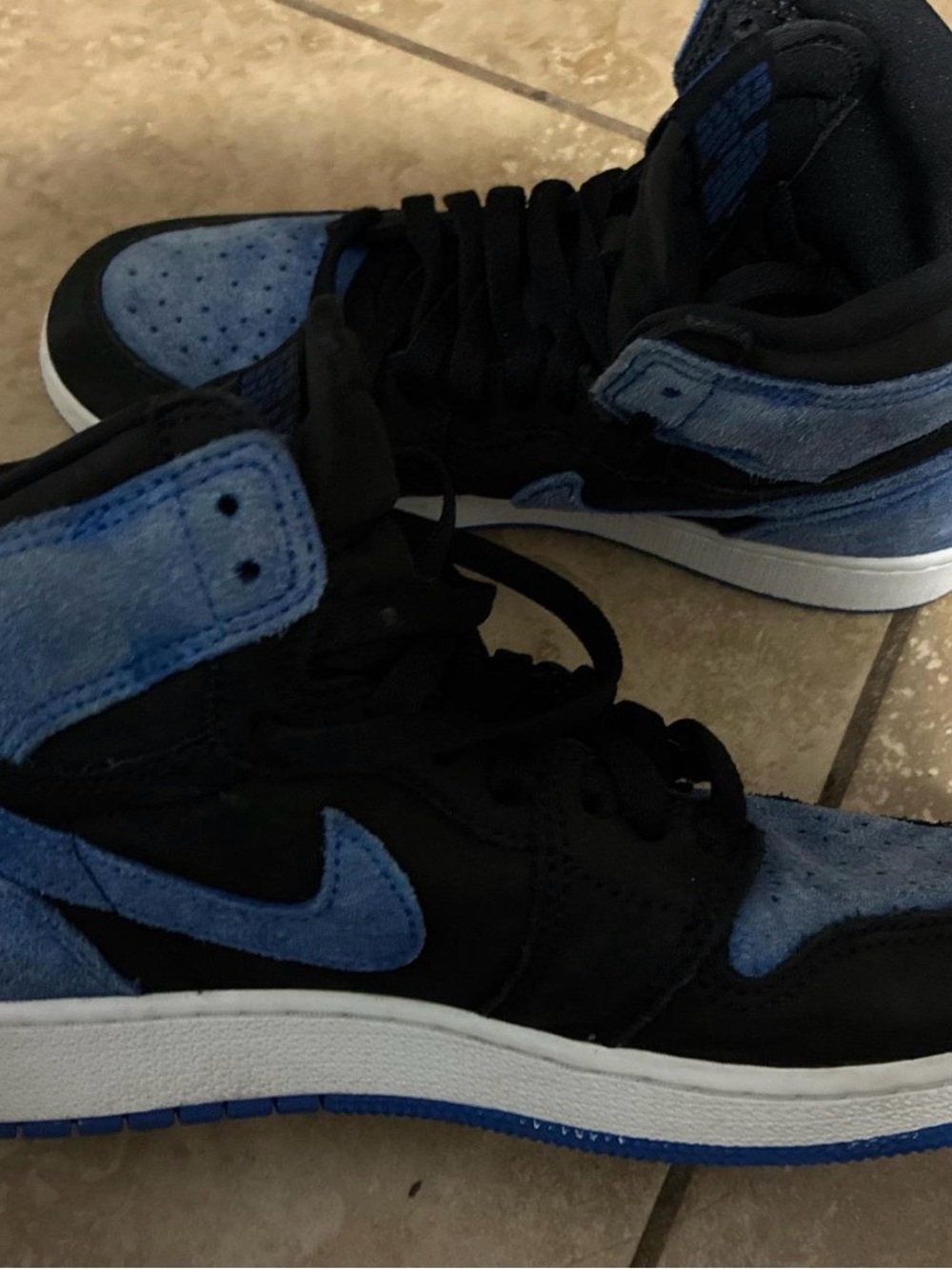 Jordan Men’s High-Top Sneakers in Black and Blue
